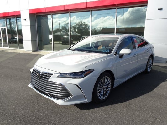 A white 2022 Toyota Avalon Limited at Marianna Toyota