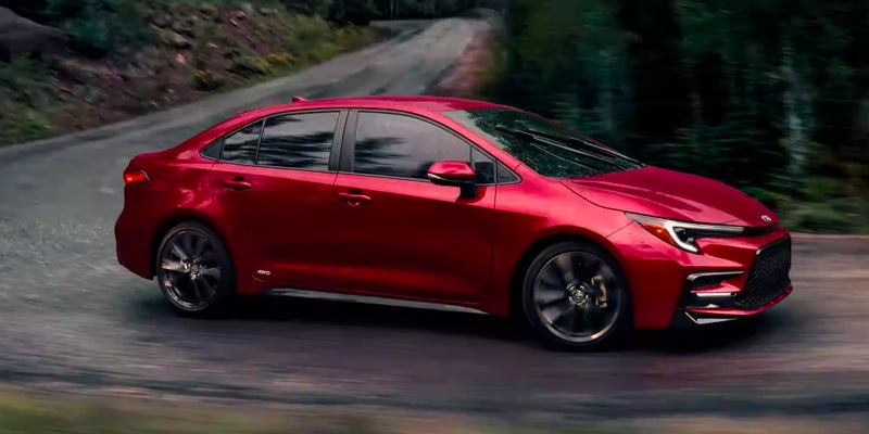 2024 Toyota Corolla driving around a curve